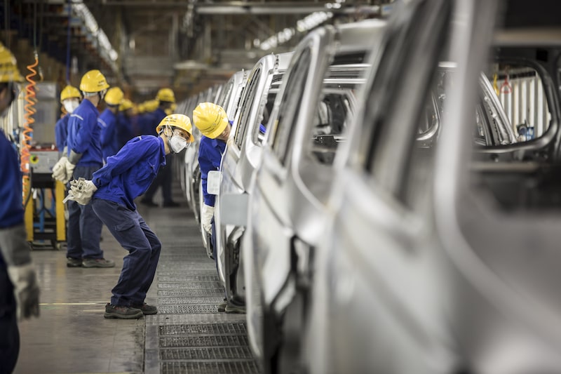 Employees inspect vehicles in the weld shop at the SAIC-GM-Wuling Automobile Co. Baojun Base plant, a joint venture between SAIC Motor Corp., General Motors Co. and Liuzhou Wuling Automobile Industry Co., in Liuzhou, Guangxi province, China, on Wednesday, May 23, 2018. GM and its partners sold 4 million vehicles in China in 2017, about 1 million more than the automaker sold in the U.S. Photographer: Qilai Shen/Bloomberg Employees inspect vehicles in the weld shop at the SAIC-GM-Wuling Automobile Co. Baojun Base plant, a joint venture between SAIC Motor Corp., General Motors Co. and Liuzhou Wuling Automobile Industry Co., in Liuzhou, Guangxi province, China, on Wednesday, May 23, 2018. GM and its partners sold 4 million vehicles in China in 2017, about 1 million more than the automaker sold in the U.S. Photographer: Qilai Shen/Bloomberg