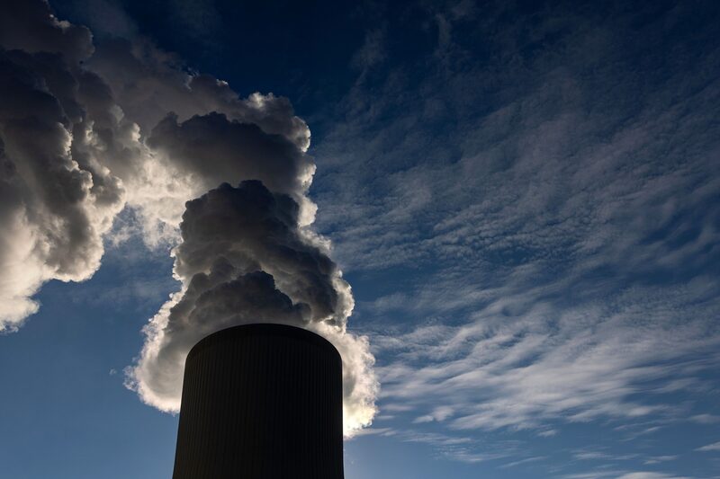 Vapor rises from a cooling tower against a cloudy blue sky. Photographer: Krisztian Bocsi/Bloomberg Vapor rises from a cooling tower against a cloudy blue sky. Photographer: Krisztian Bocsi/Bloomberg