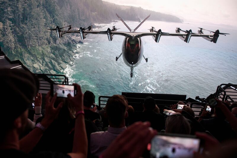 Attendees watch as the Archer Aviation Maker is unveiled on June 10, 2021 in Hawthorne, California. Attendees watch as the Archer Aviation Maker is unveiled on June 10, 2021 in Hawthorne, California.