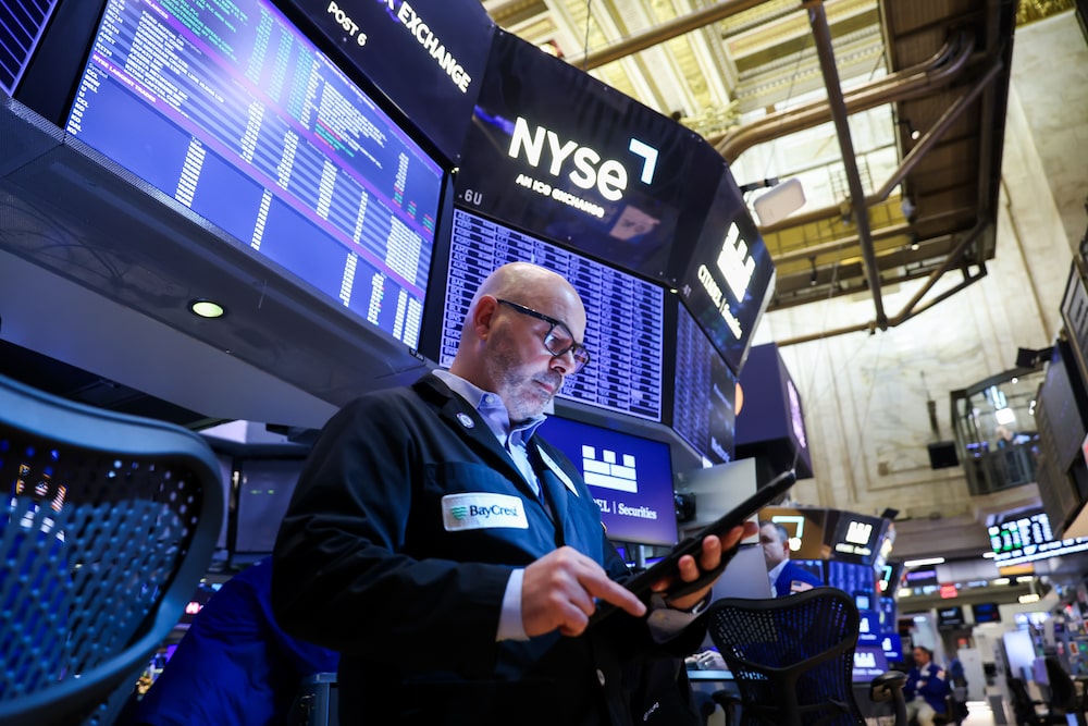 A trader works on the floor of the New York Stock Exchange (NYSE) in New York, US, on Tuesday, May 26, 2026. Wall Street kicked off the holiday-shortened week with stocks joining bonds higher as hopes for a peace deal between the US and Iran overshadowed military strikes in the Persian Gulf. Photographer: Michael Nagle/Bloomberg A trader works on the floor of the New York Stock Exchange (NYSE) in New York, US, on Tuesday, May 26, 2026. Wall Street kicked off the holiday-shortened week with stocks joining bonds higher as hopes for a peace deal between the US and Iran overshadowed military strikes in the Persian Gulf. Photographer: Michael Nagle/Bloomberg