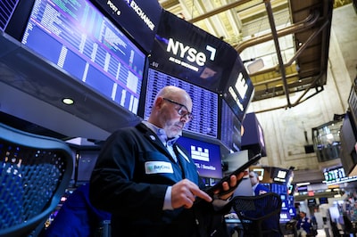 A trader works on the floor of the New York Stock Exchange (NYSE) in New York, US, on Tuesday, May 26, 2026. Wall Street kicked off the holiday-shortened week with stocks joining bonds higher as hopes for a peace deal between the US and Iran overshadowed military strikes in the Persian Gulf. Photographer: Michael Nagle/Bloomberg