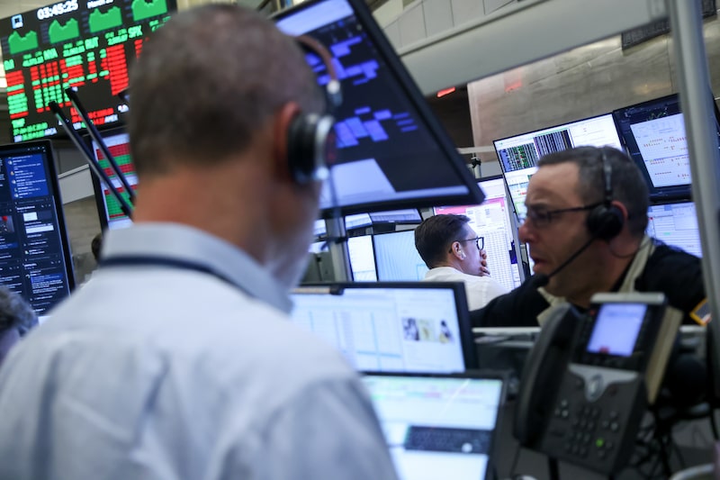 Traders work on the floor of the American Stock Exchange (AMEX) at the New York Stock Exchange (NYSE) in New York, US, on Monday, March 23, 2026. US stocks rallied on Monday after President Donald Trump ordered the Pentagon to hold off on military strikes against Iranian energy infrastructure, spurring a retreat in oil prices. Photographer: Michael Nagle/Bloomberg Traders work on the floor of the American Stock Exchange (AMEX) at the New York Stock Exchange (NYSE) in New York, US, on Monday, March 23, 2026. US stocks rallied on Monday after President Donald Trump ordered the Pentagon to hold off on military strikes against Iranian energy infrastructure, spurring a retreat in oil prices. Photographer: Michael Nagle/Bloomberg