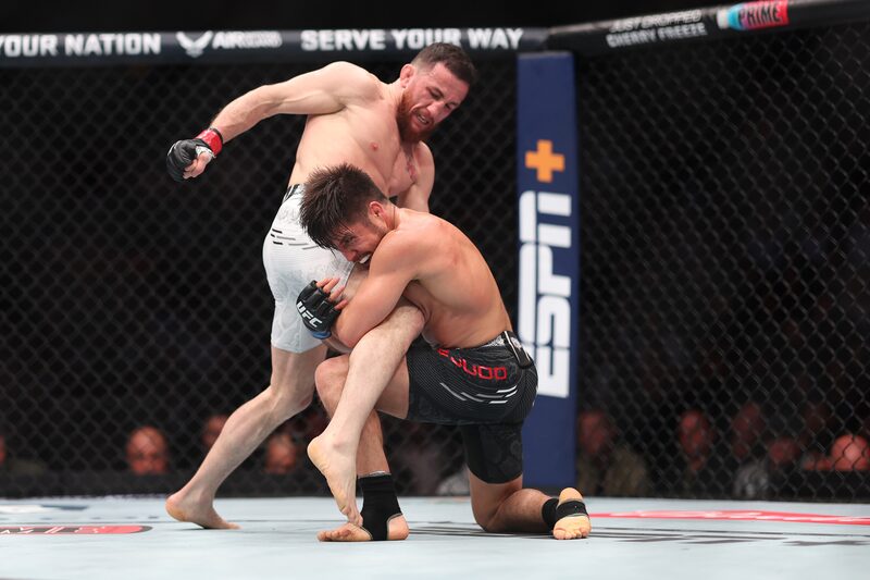 ANAHEIM, CALIFORNIA - FEBRUARY 17: Merab Dvalishvili exchanges strikes with Henry Cejudo in their bantamweight weight
fight during UFC 298 at Honda Center on February 17, 2024 in Anaheim, California. (Photo by Sean M. Haffey/Getty Images) ANAHEIM, CALIFORNIA - FEBRUARY 17: Merab Dvalishvili exchanges strikes with Henry Cejudo in their bantamweight weight
fight during UFC 298 at Honda Center on February 17, 2024 in Anaheim, California. (Photo by Sean M. Haffey/Getty Images)
