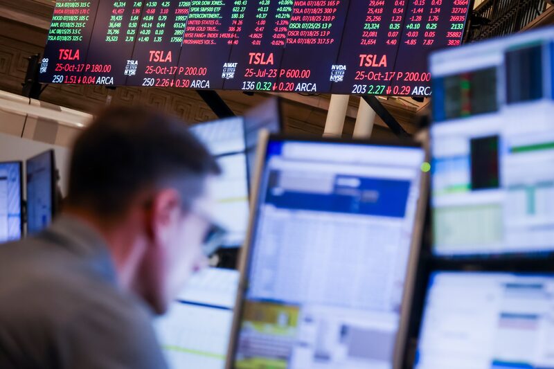 A trader at the New York Stock Exchange. A trader at the New York Stock Exchange.