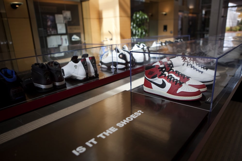 Nike Inc. Air Jordan shoes on display at the company's headquarters in Beaverton, Oregon, U.S., on Wednesday, Oct. 9, 2013. Nike Inc., the world's largest sporting-goods maker, said annual sales will rise to $36 billion by the end of fiscal 2017, lead by its apparel unit. Photographer: Natalie Behring/Bloomberg Nike Inc. Air Jordan shoes on display at the company's headquarters in Beaverton, Oregon, U.S., on Wednesday, Oct. 9, 2013. Nike Inc., the world's largest sporting-goods maker, said annual sales will rise to $36 billion by the end of fiscal 2017, lead by its apparel unit. Photographer: Natalie Behring/Bloomberg