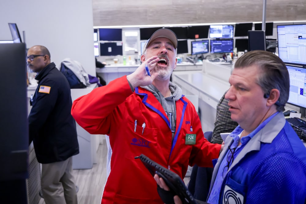 Traders At The New York Stock Exchange As Stocks Stage Comeback At The End Of A Jittery Week Traders At The New York Stock Exchange As Stocks Stage Comeback At The End Of A Jittery Week