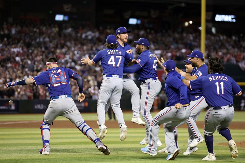 The Texas Rangers celebrate after beating the Arizona Diamondbacks 5-0 in Game Five to win the World Series The Texas Rangers celebrate after beating the Arizona Diamondbacks 5-0 in Game Five to win the World Series