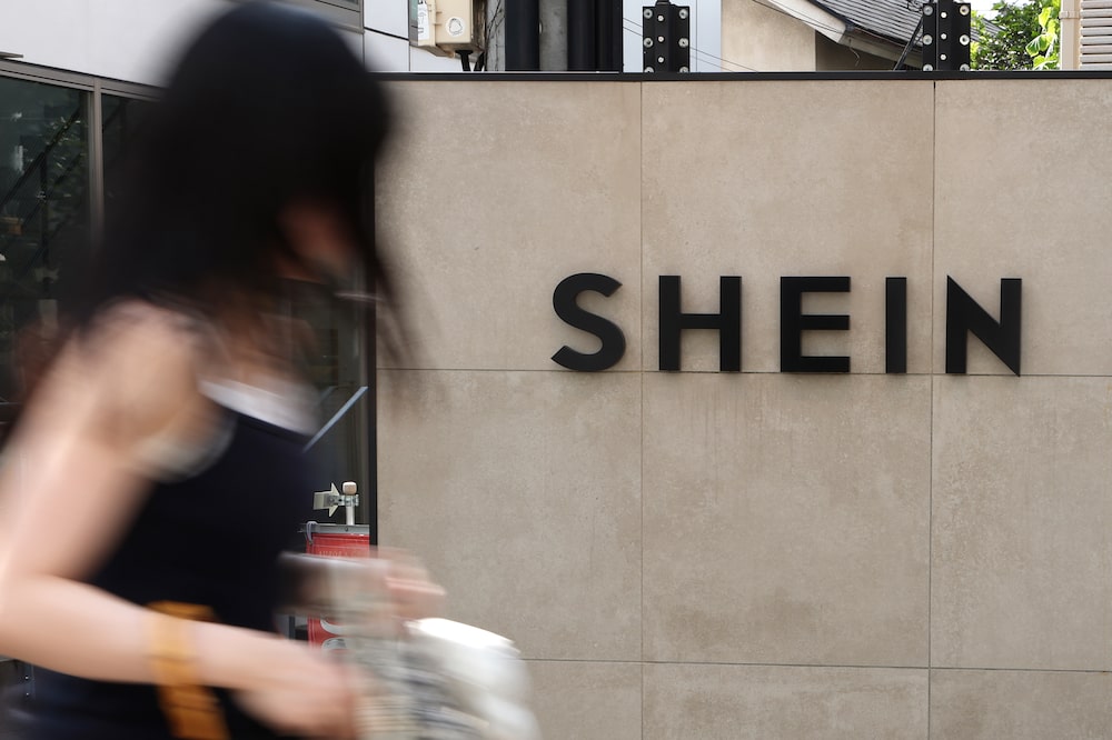 Signage outside the Shein Tokyo showroom in the Harajuku district of Tokyo, Japan, on Wednesday, Aug. 26, 2026. Shein Global Holdings Ltd.'s Hong Kong share sale, which kicked off this week, is said to have raised $1.7 billion in proceeds and value the business at just over $26 billion. Photographer: Kiyoshi Ota/Bloomberg Signage outside the Shein Tokyo showroom in the Harajuku district of Tokyo, Japan, on Wednesday, Aug. 26, 2026. Shein Global Holdings Ltd.'s Hong Kong share sale, which kicked off this week, is said to have raised $1.7 billion in proceeds and value the business at just over $26 billion. Photographer: Kiyoshi Ota/Bloomberg