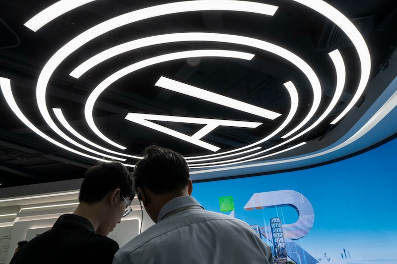 Signage for artificial intelligence at the iRootech Technology Co. offices in Guangzhou, China. Photographer: Qilai Shen/Bloomberg Signage for artificial intelligence at the iRootech Technology Co. offices in Guangzhou, China. Photographer: Qilai Shen/Bloomberg