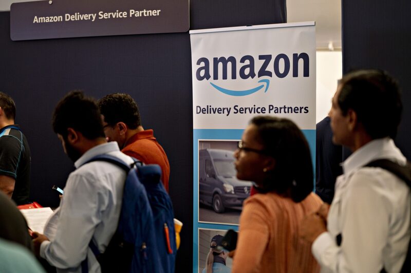 Trabalhadores da Amazon precisam ir três vezes por semana ao escritório (Foto: Andrew Harrer/Bloomberg) Trabalhadores da Amazon precisam ir três vezes por semana ao escritório (Foto: Andrew Harrer/Bloomberg)