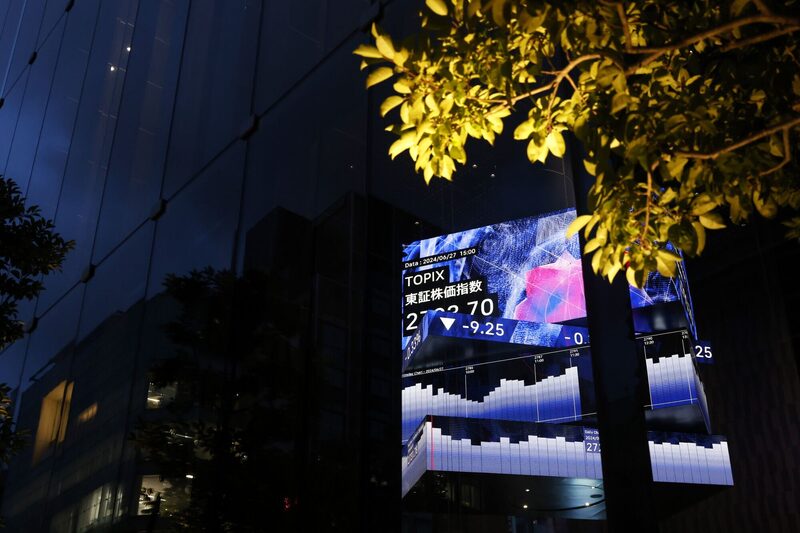 An illuminated electronic stock board showing the Topix Index displayed inside the Kabuto One building at dusk in Tokyo, Japan, on Thursday, June 27, 2024. The slump in the yen has gone so far that its no longer giving a boost to Japanese stocks. Photographer: Kiyoshi Ota/Bloomberg An illuminated electronic stock board showing the Topix Index displayed inside the Kabuto One building at dusk in Tokyo, Japan, on Thursday, June 27, 2024. The slump in the yen has gone so far that its no longer giving a boost to Japanese stocks. Photographer: Kiyoshi Ota/Bloomberg