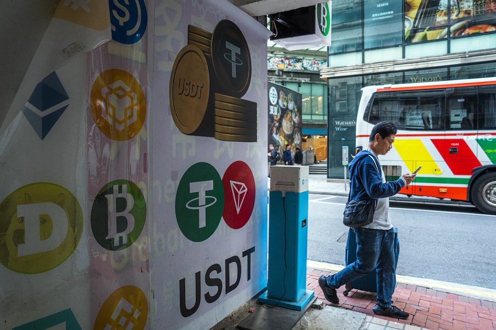 Signage for Bitcoin and Tether cryptocurrencies in Hong Kong, China, on Wednesday, Nov. 26, 2025. The intense selling pressure that has weighed on Bitcoin in recent weeks looks to be easing, raising hopes that the token's brutal slide is nearing an end. Photographer: Lam Yik/Bloomberg via Getty Images Signage for Bitcoin and Tether cryptocurrencies in Hong Kong, China, on Wednesday, Nov. 26, 2025. The intense selling pressure that has weighed on Bitcoin in recent weeks looks to be easing, raising hopes that the token's brutal slide is nearing an end. Photographer: Lam Yik/Bloomberg via Getty Images