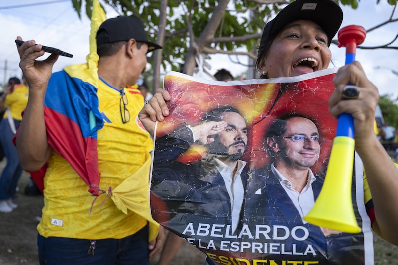 Supporters of Abelardo de la Espriella, presidential candidate for the Defenders of the Homeland party, not pictured, during a runoff election night rally at the party headquarters in Barranquilla, Colombia, on Sunday, June 21, 2026. Colombia elected conservative lawyer De la Espriella president on Sunday, heralding a swing back to business-friendly and pro-US policies after four years of leftist rule. Photographer: Carlos Parra Rios/Bloomberg Supporters of Abelardo de la Espriella, presidential candidate for the Defenders of the Homeland party, not pictured, during a runoff election night rally at the party headquarters in Barranquilla, Colombia, on Sunday, June 21, 2026. Colombia elected conservative lawyer De la Espriella president on Sunday, heralding a swing back to business-friendly and pro-US policies after four years of leftist rule. Photographer: Carlos Parra Rios/Bloomberg