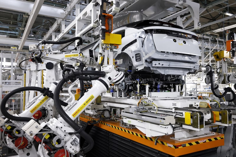 A Nissan Motor Co. Ariya electric crossover sport utility vehicle (SUV) is assembled by robots with the universal powertrain mounting system in the production line during a demonstration at the company's plant in Kaminokawa, Tochigi Prefecture, Japan A Nissan Motor Co. Ariya electric crossover sport utility vehicle (SUV) is assembled by robots with the universal powertrain mounting system in the production line during a demonstration at the company's plant in Kaminokawa, Tochigi Prefecture, Japan