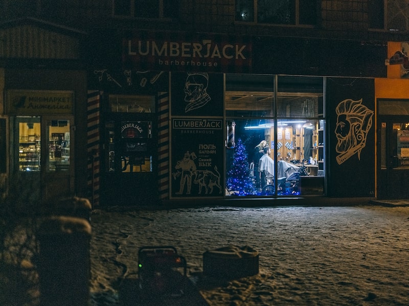 A barbershop powered by a generator remains open during a blackout in Kyiv, on Jan. 12.
Photographer: Julia Kochetova/Bloomberg A barbershop powered by a generator remains open during a blackout in Kyiv, on Jan. 12.
Photographer: Julia Kochetova/Bloomberg