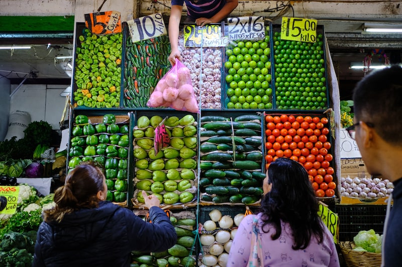 Shoppers browse vegetables and fruits for sale at the retail area of the Central de Abastos market in Mexico City, Mexico, on Saturday, July 12, 2025. The US Commerce Department announced in April it was terminating a long-running agreement with the country's southern neighbor over tomato prices on July 14, which will unleash a 17% levy on the fruits imported from Mexico. Photographer: Mauricio Palos/Bloomberg Shoppers browse vegetables and fruits for sale at the retail area of the Central de Abastos market in Mexico City, Mexico, on Saturday, July 12, 2025. The US Commerce Department announced in April it was terminating a long-running agreement with the country's southern neighbor over tomato prices on July 14, which will unleash a 17% levy on the fruits imported from Mexico. Photographer: Mauricio Palos/Bloomberg