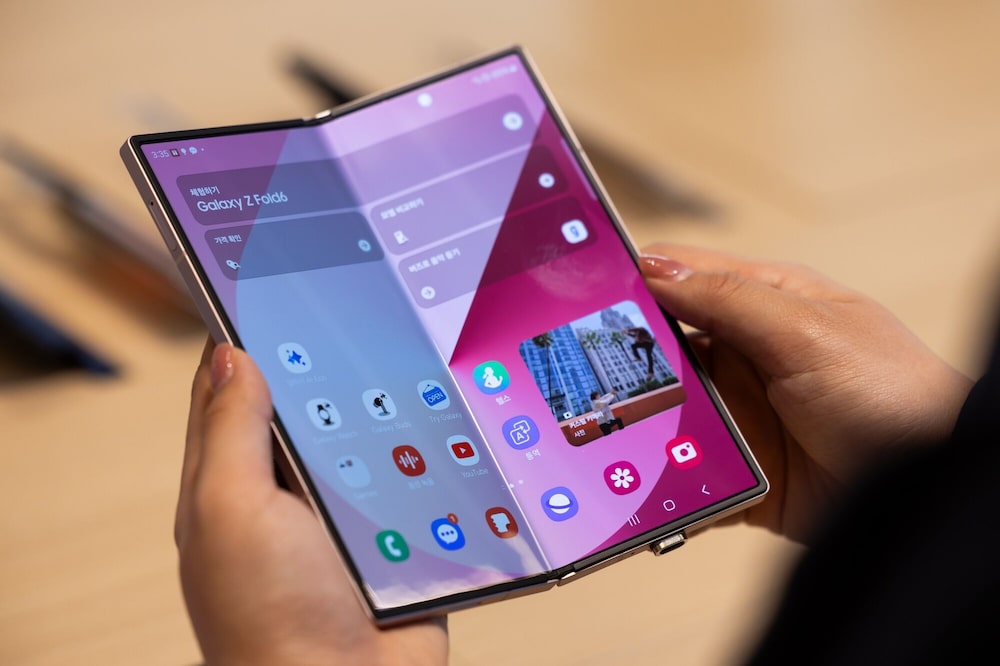 A Samsung Electronics Co. Galaxy Z Fold 6 smartphone displayed at a Samsung store in Seoul, South Korea, on Friday, Oct. 4, 2024. Samsung is expected to report record-high revenue in the September quarter, buoyed by a recovery in chip prices and strong demand for AI-supporting high-bandwidth memory. Photographer: SeongJoon Cho/Bloomberg A Samsung Electronics Co. Galaxy Z Fold 6 smartphone displayed at a Samsung store in Seoul, South Korea, on Friday, Oct. 4, 2024. Samsung is expected to report record-high revenue in the September quarter, buoyed by a recovery in chip prices and strong demand for AI-supporting high-bandwidth memory. Photographer: SeongJoon Cho/Bloomberg