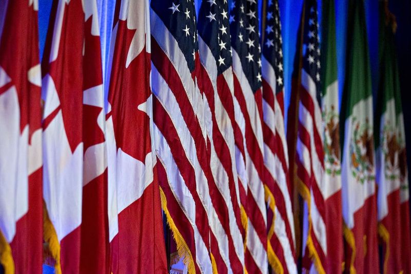 Canadian, American and Mexican flags stand on stage ahead of a North American Free Trade Agreement (NAFTA) renegotiation in Washington, D.C., U.S. Photographer: Andrew Harrer/Bloomberg Canadian, American and Mexican flags stand on stage ahead of a North American Free Trade Agreement (NAFTA) renegotiation in Washington, D.C., U.S. Photographer: Andrew Harrer/Bloomberg