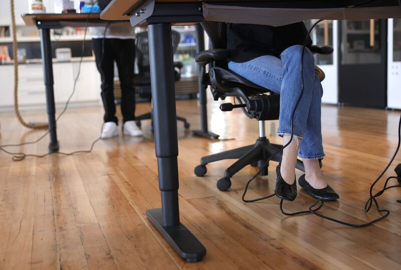 SAN FRANCISCO, CALIFORNIA - MARCH 24: Employees at tech startup company Fast work at their desks in the office on March 24, 2021 in San Francisco, California. A limited number of employees at a tech company in San Francisco returned to work in the office as San Francisco and 5 other California counties moved into the orange tier of reopening. The orange tier allows non-essential offices to open at 25% capacity. (Photo by Justin Sullivan/Getty Images) SAN FRANCISCO, CALIFORNIA - MARCH 24: Employees at tech startup company Fast work at their desks in the office on March 24, 2021 in San Francisco, California. A limited number of employees at a tech company in San Francisco returned to work in the office as San Francisco and 5 other California counties moved into the orange tier of reopening. The orange tier allows non-essential offices to open at 25% capacity. (Photo by Justin Sullivan/Getty Images)