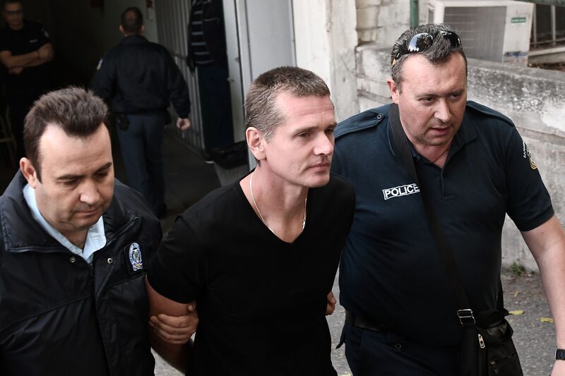 Russian Alexander Vinnik (C) is escorted by police officers as he arrives at a courthouse in Thessaloniki on October 4, 2017.
Alexander Vinnik, who headed BTC-e, an exchange he operated for the Bitcoin crypto-currency, was indicted by a US court in late July on 21 charges ranging from identity theft and facilitating drug trafficking to money laundering. Moscow has requested the extradition of Russian national also wanted in the United States for laundering billions of dollars through a Bitcoin exchange he operated. / AFP PHOTO / SAKIS MITROLIDIS (Photo credit should read SAKIS MITROLIDIS/AFP via Getty Images) Russian Alexander Vinnik (C) is escorted by police officers as he arrives at a courthouse in Thessaloniki on October 4, 2017.
Alexander Vinnik, who headed BTC-e, an exchange he operated for the Bitcoin crypto-currency, was indicted by a US court in late July on 21 charges ranging from identity theft and facilitating drug trafficking to money laundering. Moscow has requested the extradition of Russian national also wanted in the United States for laundering billions of dollars through a Bitcoin exchange he operated. / AFP PHOTO / SAKIS MITROLIDIS (Photo credit should read SAKIS MITROLIDIS/AFP via Getty Images)