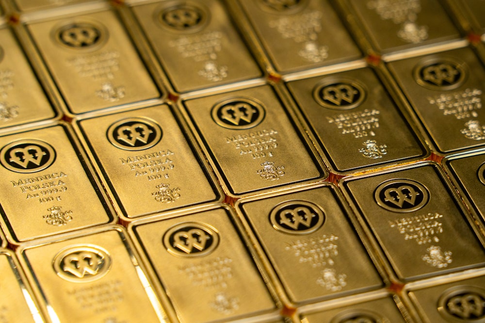 A selection of 100 gram gold bars at the Polish mint, also known as Mennica Polska SA, in Warsaw, Poland, on Thursday, Feb. 12, 2026. Polands central bank, the worlds biggest reported buyer of gold, is boosting purchases by another 150 tons as it braces for more of the geopolitical instability that has driven prices to record highs. Photographer: Damian Lemanski/Bloomberg A selection of 100 gram gold bars at the Polish mint, also known as Mennica Polska SA, in Warsaw, Poland, on Thursday, Feb. 12, 2026. Polands central bank, the worlds biggest reported buyer of gold, is boosting purchases by another 150 tons as it braces for more of the geopolitical instability that has driven prices to record highs. Photographer: Damian Lemanski/Bloomberg