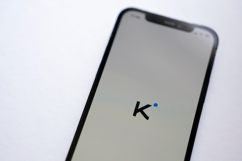 The logo for Moonshot AI's Kimi chatbot arranged on a smartphone in Shanghai, China, on Wednesday, Jan. 7, 2026. Chinese firms such as Moonshot have released AI models that approach the capabilities of leading systems from US companies, spurred on by a government that has made AI leadership a national priority. Photographer: Raul Ariano/Bloomberg The logo for Moonshot AI's Kimi chatbot arranged on a smartphone in Shanghai, China, on Wednesday, Jan. 7, 2026. Chinese firms such as Moonshot have released AI models that approach the capabilities of leading systems from US companies, spurred on by a government that has made AI leadership a national priority. Photographer: Raul Ariano/Bloomberg