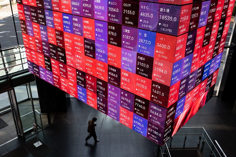 An electronic stock board inside the Kabuto One building in Tokyo, Japan, on Monday, Nov. 21, 2022. The world's central banks must keep raising interest rates to fight soaring and pervasive inflation, even as the global economy sinks into a significant slowdown, the OECD said. Photographer: SeongJoon Cho/Bloomberg An electronic stock board inside the Kabuto One building in Tokyo, Japan, on Monday, Nov. 21, 2022. The world's central banks must keep raising interest rates to fight soaring and pervasive inflation, even as the global economy sinks into a significant slowdown, the OECD said. Photographer: SeongJoon Cho/Bloomberg