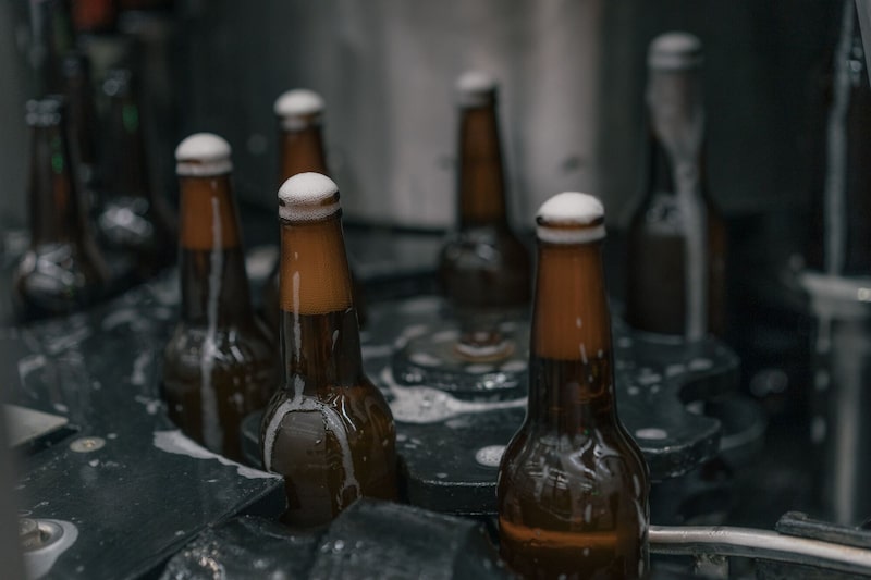 Bottles filled with beer on the production line. Photographer: Bloomberg Creative Photos/Bloomberg Creative Collection Bottles filled with beer on the production line. Photographer: Bloomberg Creative Photos/Bloomberg Creative Collection