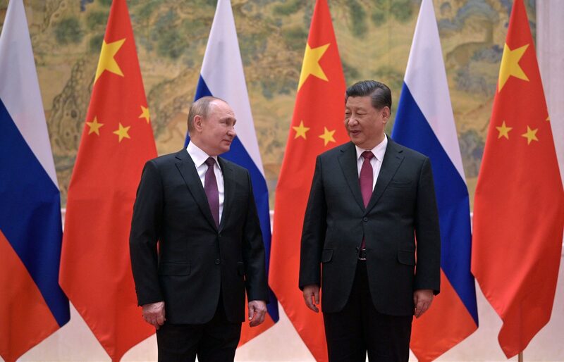 Russian President Vladimir Putin (L) and Chinese President Xi Jinping pose during their meeting in Beijing, on February 4, 2022. Photographer: Alexei Druzhinin/Sputnik/AFP/Getty Images Russian President Vladimir Putin (L) and Chinese President Xi Jinping pose during their meeting in Beijing, on February 4, 2022. Photographer: Alexei Druzhinin/Sputnik/AFP/Getty Images