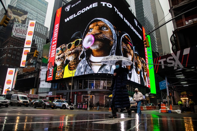 An advertisement for Big Cats non-fungible token (NFT) on an electronic billboard in the Times Square neighborhood of New York, U.S. An advertisement for Big Cats non-fungible token (NFT) on an electronic billboard in the Times Square neighborhood of New York, U.S.