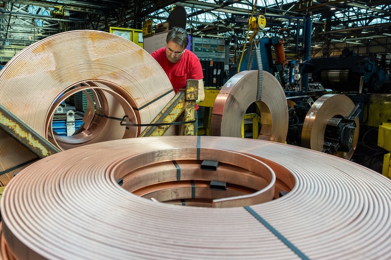 A worker moves a roll of copper at Revere Copper Products in Rome, New York, US, on Wednesday, Aug. 6, 2025. US President Donald Trump went ahead with 50% tariffs on copper imports but exempted refined metals, which are the mainstay of international trading. Photographer: Lauren Petracca/Bloomberg A worker moves a roll of copper at Revere Copper Products in Rome, New York, US, on Wednesday, Aug. 6, 2025. US President Donald Trump went ahead with 50% tariffs on copper imports but exempted refined metals, which are the mainstay of international trading. Photographer: Lauren Petracca/Bloomberg