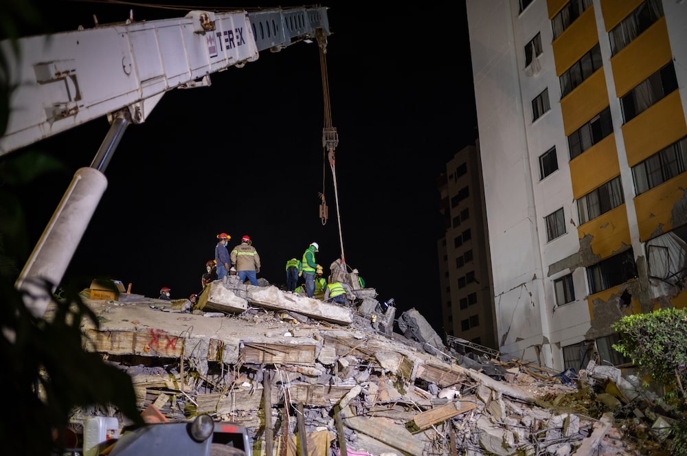 Rescue workers remove rubble from the Cantabria building following the earthquake in Cali, Colombia, on Thursday, Aug. 13, 2026. Colombia turned down a Mexican rescue team that sought to assist with earthquake rescue efforts, raising questions about the governments management of the disaster as the death toll mounted and an aftershock prompted fresh evacuations. Photographer: Nathalia Angarita/Bloomberg Rescue workers remove rubble from the Cantabria building following the earthquake in Cali, Colombia, on Thursday, Aug. 13, 2026. Colombia turned down a Mexican rescue team that sought to assist with earthquake rescue efforts, raising questions about the governments management of the disaster as the death toll mounted and an aftershock prompted fresh evacuations. Photographer: Nathalia Angarita/Bloomberg