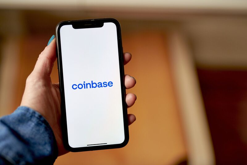 The Coinbase logo on a smartphone arranged in the Brooklyn borough of New York, US, on Wednesday, June 7, 2023. The list of digital tokens deemed as unregistered securities by the Securities and Exchange Commission now spans over $120 billion of crypto after the US agencys lawsuits against Binance Holdings Ltd. and Coinbase Global Inc. Photographer: Gabby Jones/Bloomberg The Coinbase logo on a smartphone arranged in the Brooklyn borough of New York, US, on Wednesday, June 7, 2023. The list of digital tokens deemed as unregistered securities by the Securities and Exchange Commission now spans over $120 billion of crypto after the US agencys lawsuits against Binance Holdings Ltd. and Coinbase Global Inc. Photographer: Gabby Jones/Bloomberg