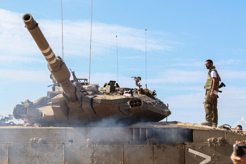 An Israeli armored unit close to the Gaza border near Kibbutz Be'eri, southern Israel. An Israeli armored unit close to the Gaza border near Kibbutz Be'eri, southern Israel.