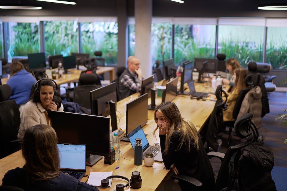 Workers at the Globant SA office. Workers at the Globant SA office.