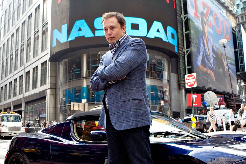 Elon Musk, chairman and chief executive officer of Tesla Motors, stands for a portrait with a Tesla Roadster outside the Nasdaq Marketsite in New York, U.S., on Tuesday, June 29, 2010 Elon Musk, chairman and chief executive officer of Tesla Motors, stands for a portrait with a Tesla Roadster outside the Nasdaq Marketsite in New York, U.S., on Tuesday, June 29, 2010