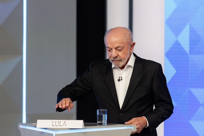 Lula e Flávio Bolsonaro em debate na TV Globo Lula e Flávio Bolsonaro em debate na TV Globo