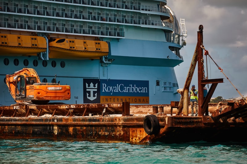Construction crews prepare to transport equipment to the Royal Caribbean's Royal Beach Club Paradise Island while under development in Nassau, Bahamas, on Monday, April 29, 2024. Cruise lines have spent at least $1.5 billion since 2019 to expand or improve private stops in the Caribbean, according to Bloomberg calculations. Photographer: Scott McIntyre/Bloomberg Construction crews prepare to transport equipment to the Royal Caribbean's Royal Beach Club Paradise Island while under development in Nassau, Bahamas, on Monday, April 29, 2024. Cruise lines have spent at least $1.5 billion since 2019 to expand or improve private stops in the Caribbean, according to Bloomberg calculations. Photographer: Scott McIntyre/Bloomberg