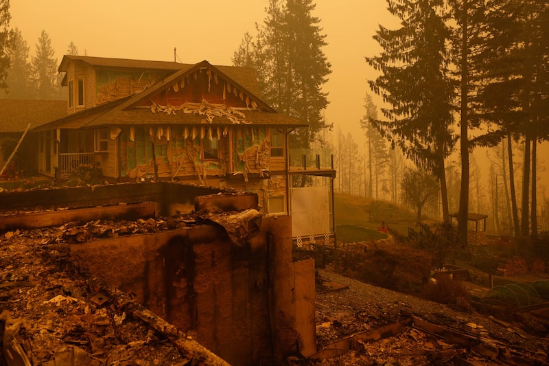 Property and homes razed by a wildfire in Celista, British Columbia, Canada, on Saturday, Aug. 19, 2023. Record-breaking wildfires in Canada, which have already scorched an area larger than Greece, are heading toward key population centers, forcing tens of thousands to evacuate. Photographer: Bloomberg/Bloomberg Property and homes razed by a wildfire in Celista, British Columbia, Canada, on Saturday, Aug. 19, 2023. Record-breaking wildfires in Canada, which have already scorched an area larger than Greece, are heading toward key population centers, forcing tens of thousands to evacuate. Photographer: Bloomberg/Bloomberg