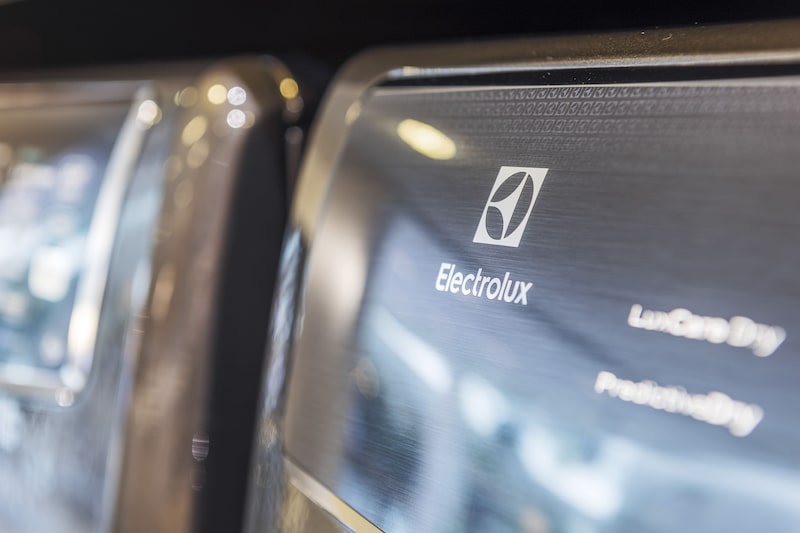 The Electrolux AB logo sits a washing machine at the company's headquarters in Stockholm, Sweden, on Thursday, Aug. 29, 2019. Regarding the recent escalation in the trade conflict, Electrolux Chief Executive Officer Jonas Samuelson says the company has "been through various stages of tariff increases over the last several quarters and so far we've been able to pass those cost increases on through higher pricing." Photographer: Mikael Sjoberg/Bloomberg The Electrolux AB logo sits a washing machine at the company's headquarters in Stockholm, Sweden, on Thursday, Aug. 29, 2019. Regarding the recent escalation in the trade conflict, Electrolux Chief Executive Officer Jonas Samuelson says the company has "been through various stages of tariff increases over the last several quarters and so far we've been able to pass those cost increases on through higher pricing." Photographer: Mikael Sjoberg/Bloomberg
