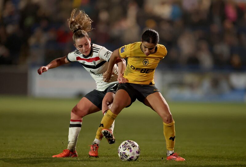 Tammi George, of Wolverhampton Wanderers, is challenged by Millie Turner, of Manchester United, during a match on February 08. Tammi George, of Wolverhampton Wanderers, is challenged by Millie Turner, of Manchester United, during a match on February 08.