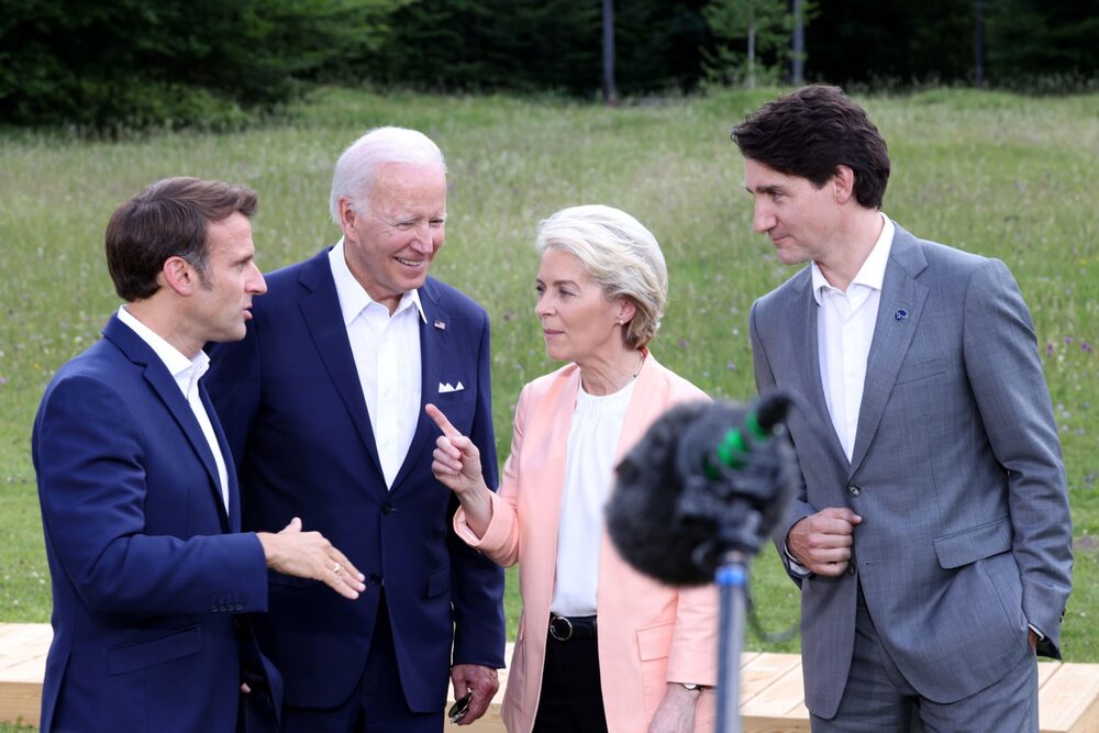 Emmanuel Macron, France's president, US President Joe Biden, Ursula von der Leyen, president of the European Commission, and Justin Trudeau, Canada's prime minister, from left, following the family photo on the first day of the Group of Seven (G-7) leaders summit at the Schloss Elmau luxury hotel in Elmau, Germany, on Sunday, June 26, 2022. Emmanuel Macron, France's president, US President Joe Biden, Ursula von der Leyen, president of the European Commission, and Justin Trudeau, Canada's prime minister, from left, following the family photo on the first day of the Group of Seven (G-7) leaders summit at the Schloss Elmau luxury hotel in Elmau, Germany, on Sunday, June 26, 2022.