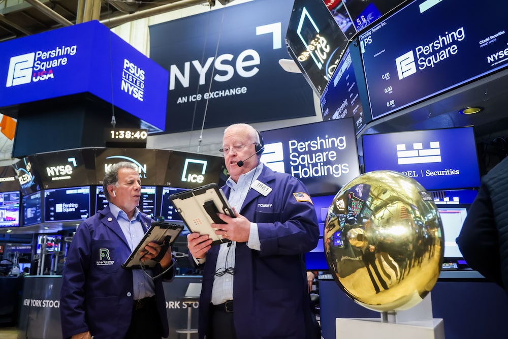 Traders work during the Pershing Square Capital Management LP initial public offering (IPO) on the floor of the New York Stock Exchange (NYSE) in New York, US, on Wednesday, April 29, 2026. Bill Ackman's combined initial public offering for his closed-end fund and alternative asset manager raised $5 billion, adding to the billionaire's war chest for Warren Buffett-style long-term investments. Photographer: Michael Nagle/Bloomberg Traders work during the Pershing Square Capital Management LP initial public offering (IPO) on the floor of the New York Stock Exchange (NYSE) in New York, US, on Wednesday, April 29, 2026. Bill Ackman's combined initial public offering for his closed-end fund and alternative asset manager raised $5 billion, adding to the billionaire's war chest for Warren Buffett-style long-term investments. Photographer: Michael Nagle/Bloomberg