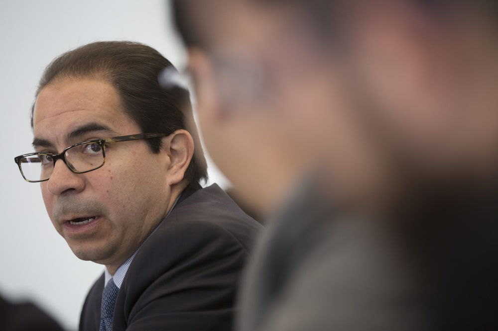 Carlos Capistran, chief Mexico economist at Bank of America Corp., speaks during a press conference at the company's headquarters in Mexico City, Mexico, on Wednesday, July 13, 2016. Capistran and Bank Of America Mexico SA Chief Executive Officer Emilio Romano discussed mid-year economic outlook for Mexico. Photographer: Susana Gonzalez/Bloomberg Carlos Capistran, chief Mexico economist at Bank of America Corp., speaks during a press conference at the company's headquarters in Mexico City, Mexico, on Wednesday, July 13, 2016. Capistran and Bank Of America Mexico SA Chief Executive Officer Emilio Romano discussed mid-year economic outlook for Mexico. Photographer: Susana Gonzalez/Bloomberg