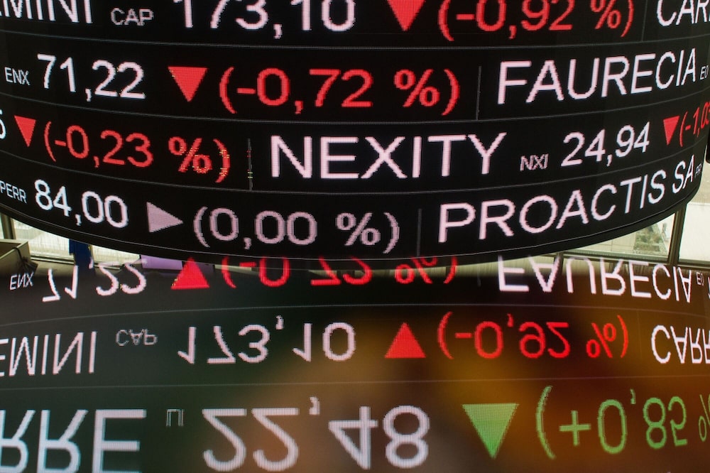 Stock price information displayed on a trading floor from the balcony inside the Euronext NV stock exchange in Paris Stock price information displayed on a trading floor from the balcony inside the Euronext NV stock exchange in Paris