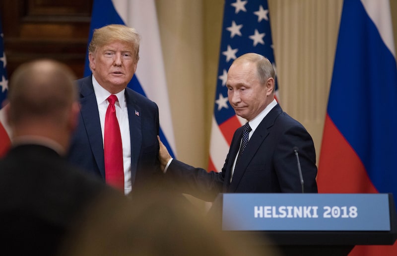 U.S. President Donald Trump, left, and Vladimir Putin, Russia's president, prepare to leave following a news conference in Helsinki, Finland, on Monday, July 16, 2018 U.S. President Donald Trump, left, and Vladimir Putin, Russia's president, prepare to leave following a news conference in Helsinki, Finland, on Monday, July 16, 2018