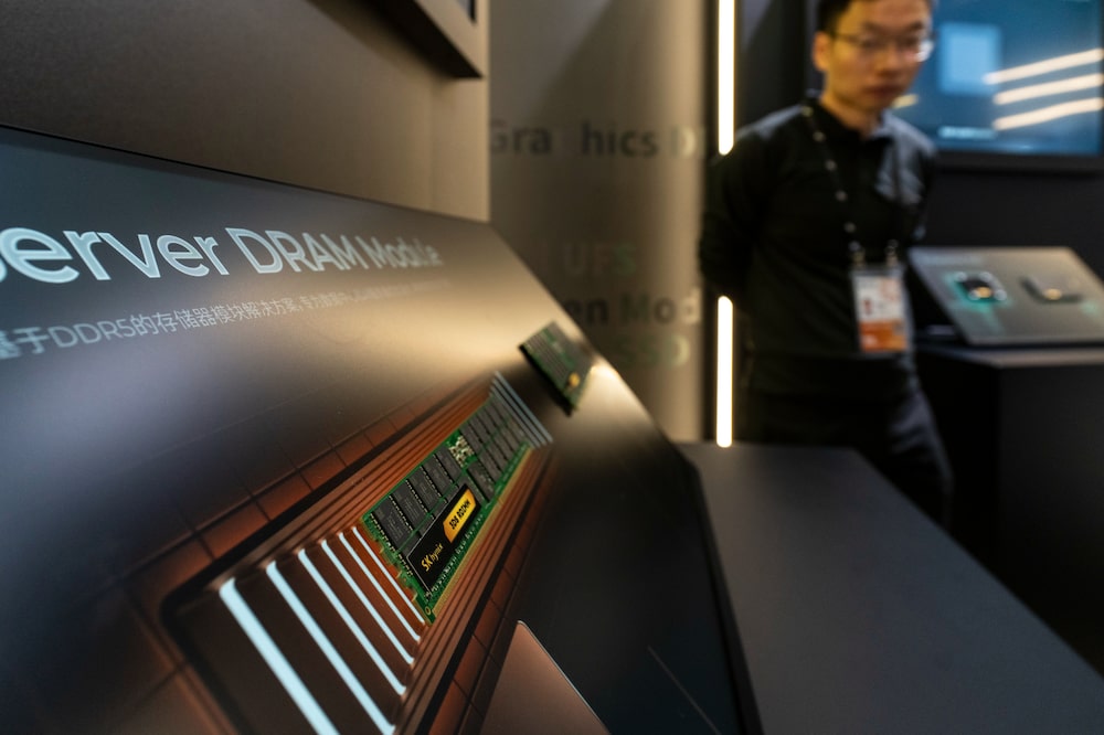 Chips on display at the SK Hynix Inc. booth at the China International Import Expo (CIIE) in Shanghai, China, on Thursday, Nov. 6, 2025. The expo runs through Nov. 10. Photographer: Qilai Shen/Bloomberg Chips on display at the SK Hynix Inc. booth at the China International Import Expo (CIIE) in Shanghai, China, on Thursday, Nov. 6, 2025. The expo runs through Nov. 10. Photographer: Qilai Shen/Bloomberg