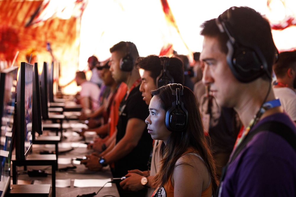 Attendees play a demo of Borderlands 3 from Take-Two Interactive Software Inc.'s 2K Games during the E3 Electronic Entertainment Expo in Los Angeles, California, U.S., on Tuesday, June 11, 2019. For three days, leading-edge companies, groundbreaking new technologies and never-before-seen products are showcased at E3. Photographer: Patrick T. Fallon/Bloomberg Attendees play a demo of Borderlands 3 from Take-Two Interactive Software Inc.'s 2K Games during the E3 Electronic Entertainment Expo in Los Angeles, California, U.S., on Tuesday, June 11, 2019. For three days, leading-edge companies, groundbreaking new technologies and never-before-seen products are showcased at E3. Photographer: Patrick T. Fallon/Bloomberg