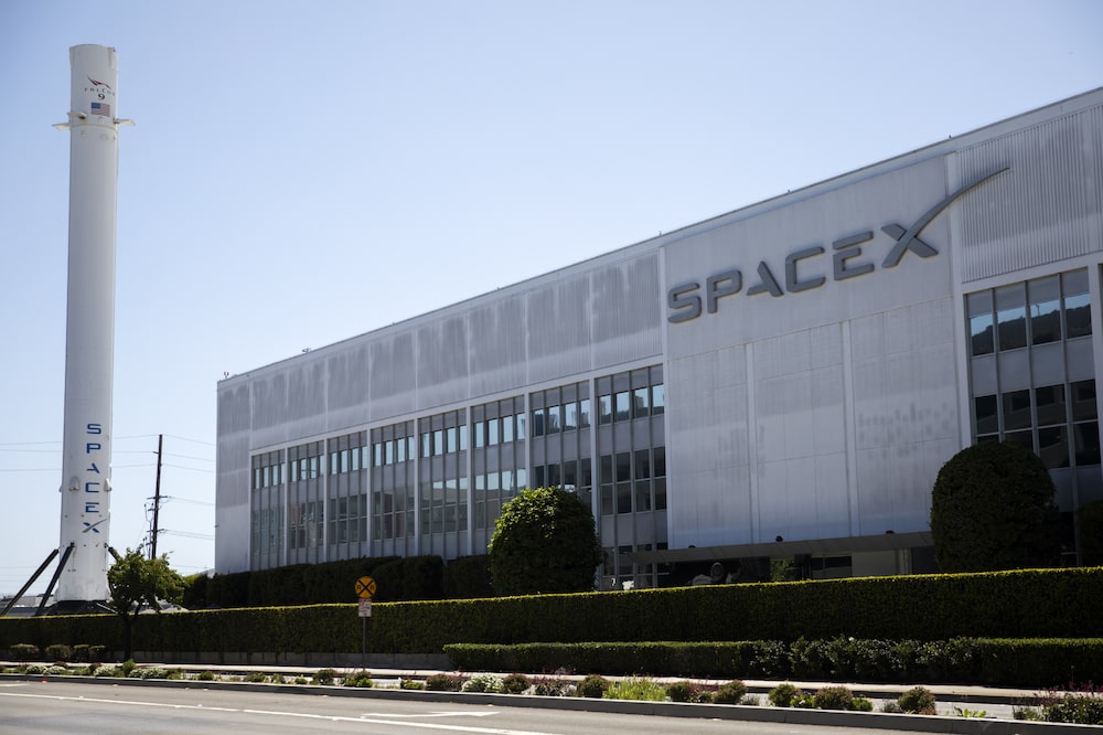 SpaceX headquarters in Hawthorne, California, US, on Tuesday, April 19, 2022. Brimming with SpaceX engineers, Hawthorne, California, has become an unlikely focal point for a new era of manufacturing. Photographer: Alisha Jucevic/Bloomberg SpaceX headquarters in Hawthorne, California, US, on Tuesday, April 19, 2022. Brimming with SpaceX engineers, Hawthorne, California, has become an unlikely focal point for a new era of manufacturing. Photographer: Alisha Jucevic/Bloomberg