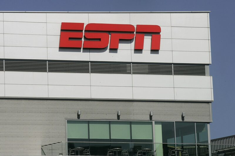 The ESPN logo is displayed outside L.A. Live, which houses the ESPNZone, in Los Angeles, California, U.S., on Tuesday, Aug. 31, 2010. Time Warner Cable Inc.'s negotiations to renew rights to ESPN may be held up on a demand by the sports channel's owner, Walt Disney Co., to be paid for a related website, people with knowledge of the talks have said. Photographer: Jonathan Alcorn/Bloomberg The ESPN logo is displayed outside L.A. Live, which houses the ESPNZone, in Los Angeles, California, U.S., on Tuesday, Aug. 31, 2010. Time Warner Cable Inc.'s negotiations to renew rights to ESPN may be held up on a demand by the sports channel's owner, Walt Disney Co., to be paid for a related website, people with knowledge of the talks have said. Photographer: Jonathan Alcorn/Bloomberg